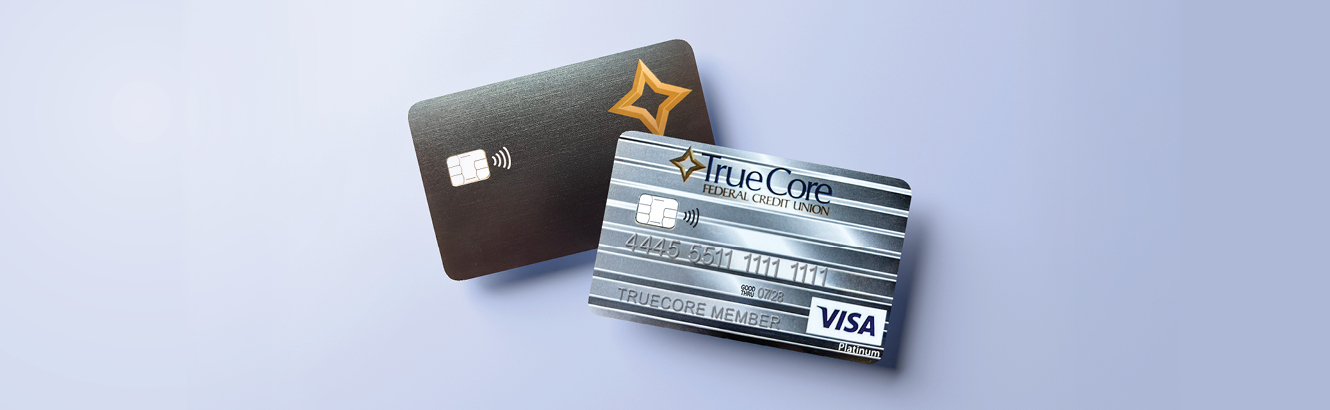 TrueCore Visa Platinum and Rewards credit cards on a light blue background. 