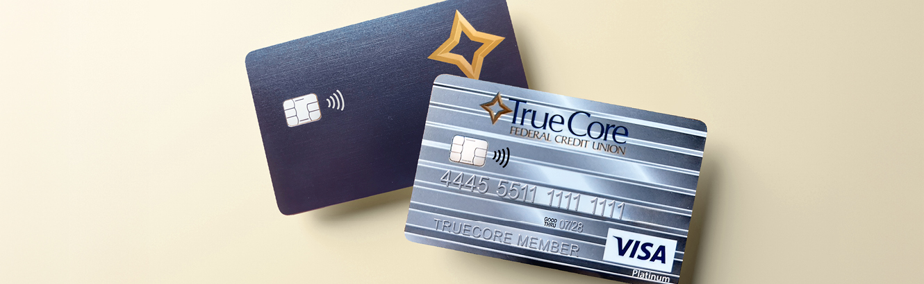 TrueCore rewards card and platinum credit card against a tan background