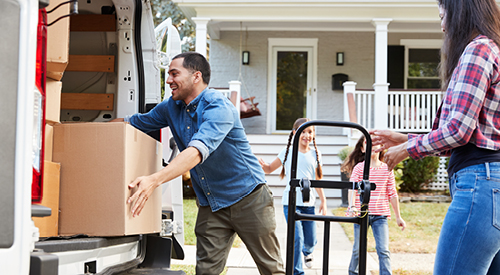 Family moving into their new home.