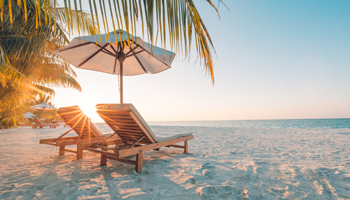 Image of chairs on a beach.